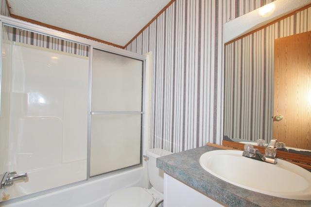 387 Needmore Road Mount Juliet, TN 37122 - Photo 14 of 20 A full bath is conveniently located near the 2nd bedroom.