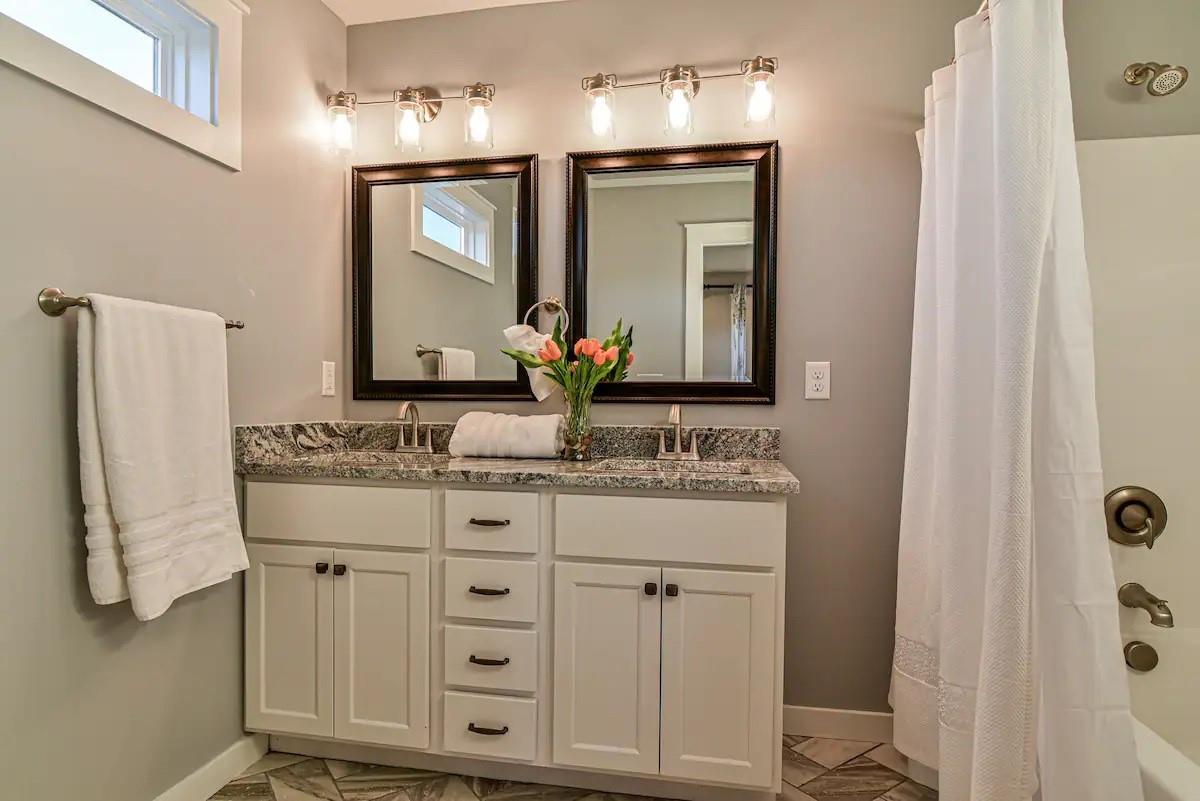 664 Old Fort Road Fairview, NC 28730 - Photo 14 of 20 a bathroom with a double vanity sink mirror and