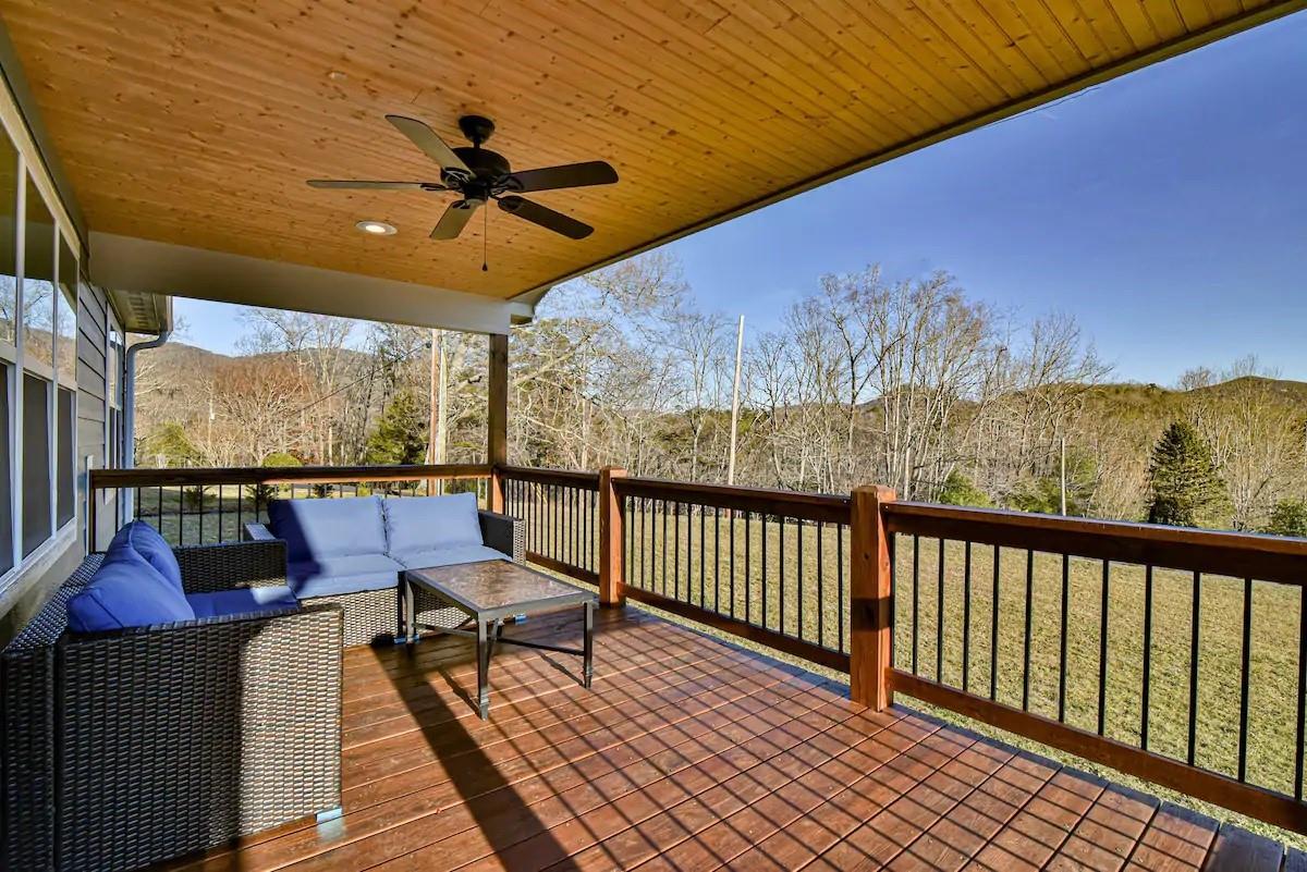 664 Old Fort Road Fairview, NC 28730 - Photo 5 of 20 a view of a chairs and table on the wooden floor