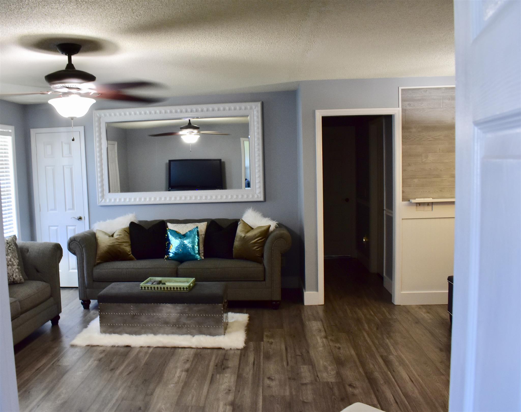 3305 Midland Road Bell Buckle, TN 37020 - Photo 3 of 27 a living room with furniture and a flat screen tv