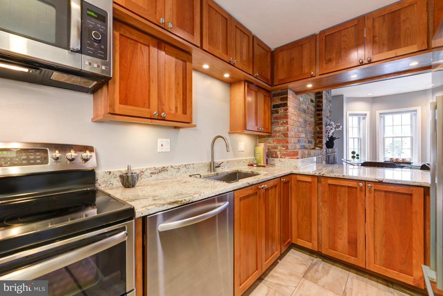309 4th Street Southeast, Unit 6 Washington, DC 20003 - Photo 14 of 27 custom kitchen with all wood cabinetry