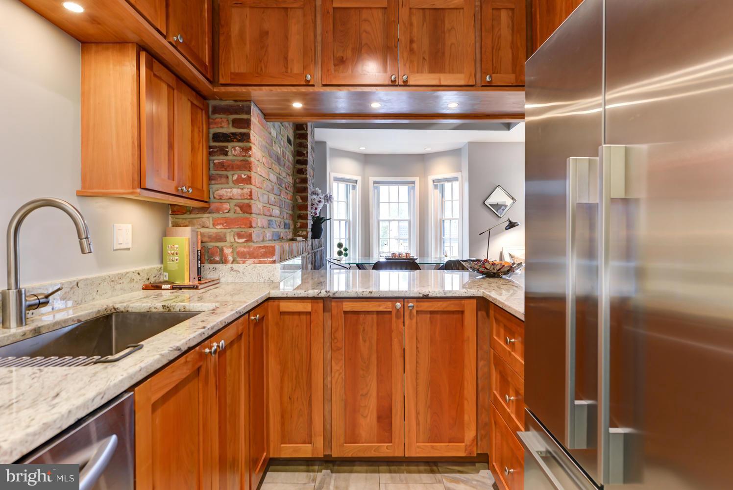309 4th Street Southeast, Unit 6 Washington, DC 20003 - Photo 15 of 27 custom kitchen with all wood cabinetry