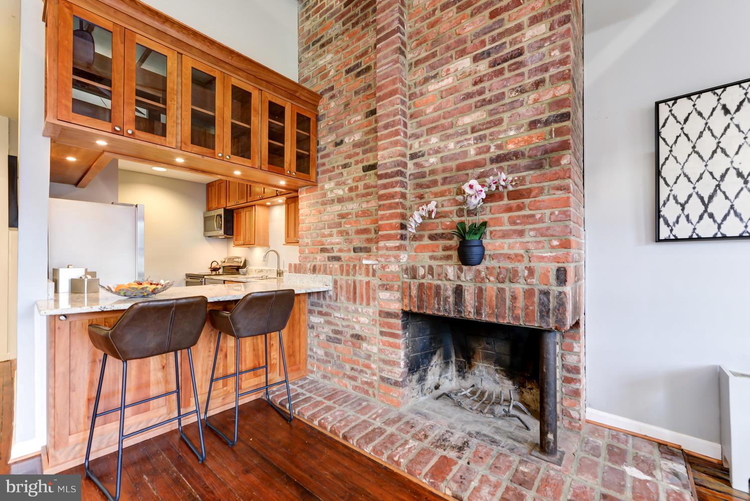 309 4th Street Southeast, Unit 6 Washington, DC 20003 - Photo 5 of 27 wood fireplace and 9+ ft ceilings!