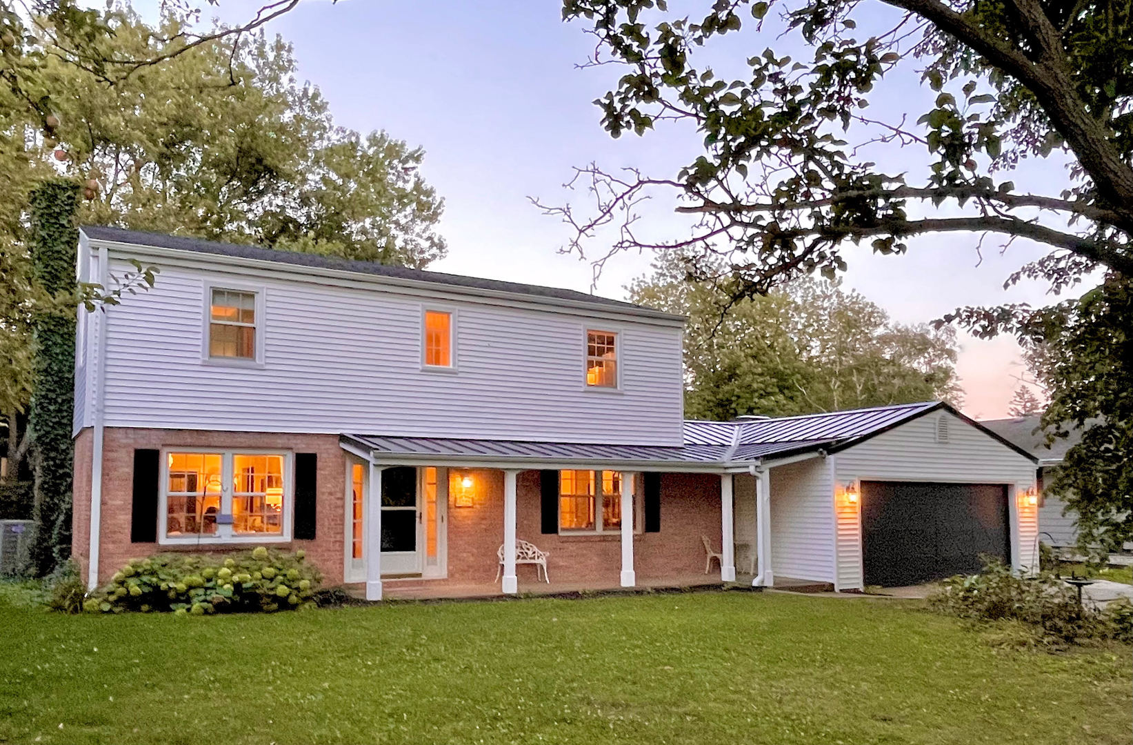 1904 Robert Drive Champaign, IL 61821 - Photo 1 of 131 a front view of house with yard and green space