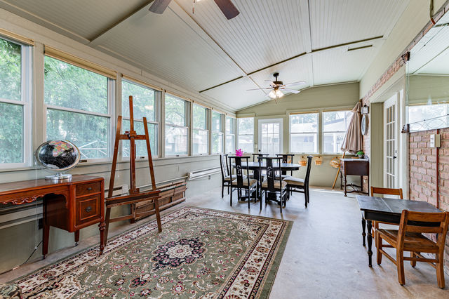 1904 Robert Drive Champaign, IL 61821 - Photo 16 of 131 a view of a dining room with furniture window and outside view