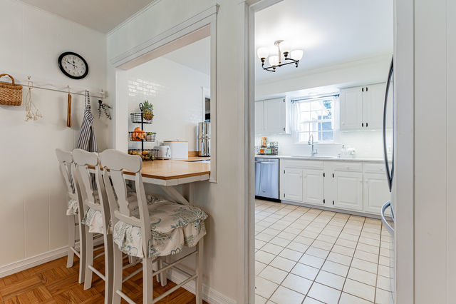 1904 Robert Drive Champaign, IL 61821 - Photo 21 of 131 a kitchen with a table and chairs