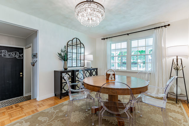 1904 Robert Drive Champaign, IL 61821 - Photo 25 of 131 a view of a dining room with furniture window and wooden floor