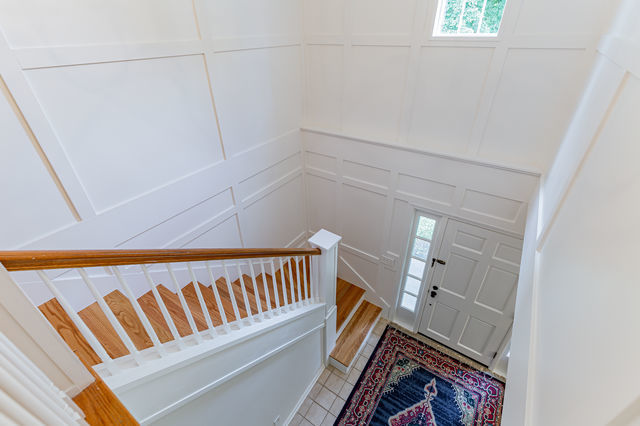 1904 Robert Drive Champaign, IL 61821 - Photo 27 of 131 a view of a hallway with stairs