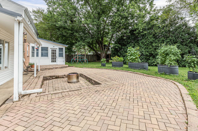 1904 Robert Drive Champaign, IL 61821 - Photo 33 of 131 a view of a backyard with sitting area