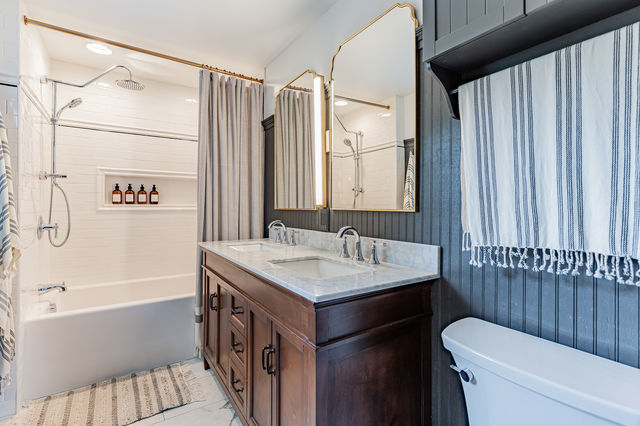 1904 Robert Drive Champaign, IL 61821 - Photo 41 of 131 a bathroom with a sink and a mirror