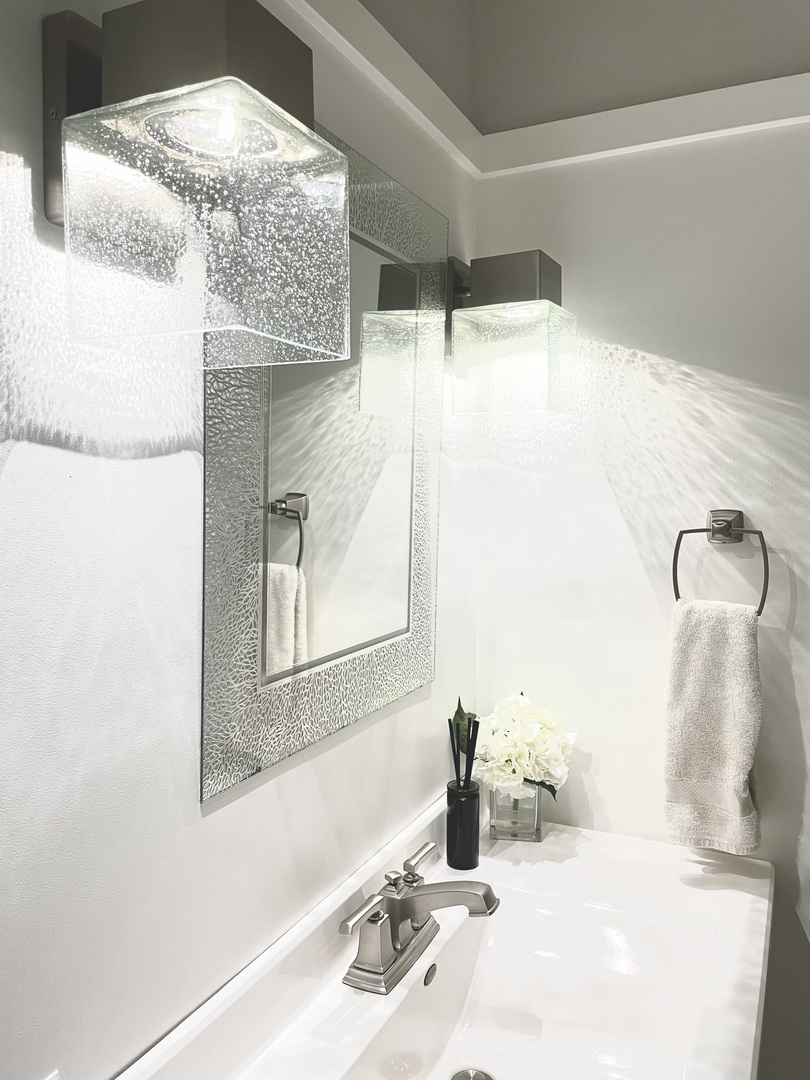 1904 Robert Drive Champaign, IL 61821 - Photo 47 of 131 a bathroom with a sink and a mirror
