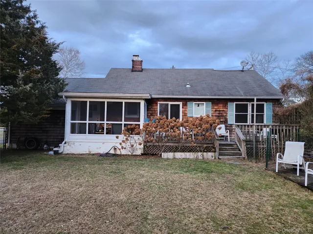 a house view with a garden space