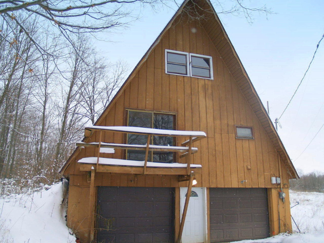 236 East Brown Road Freeport, MI 49325 - Photo 3 of 20 Garage Entrance of A Frame