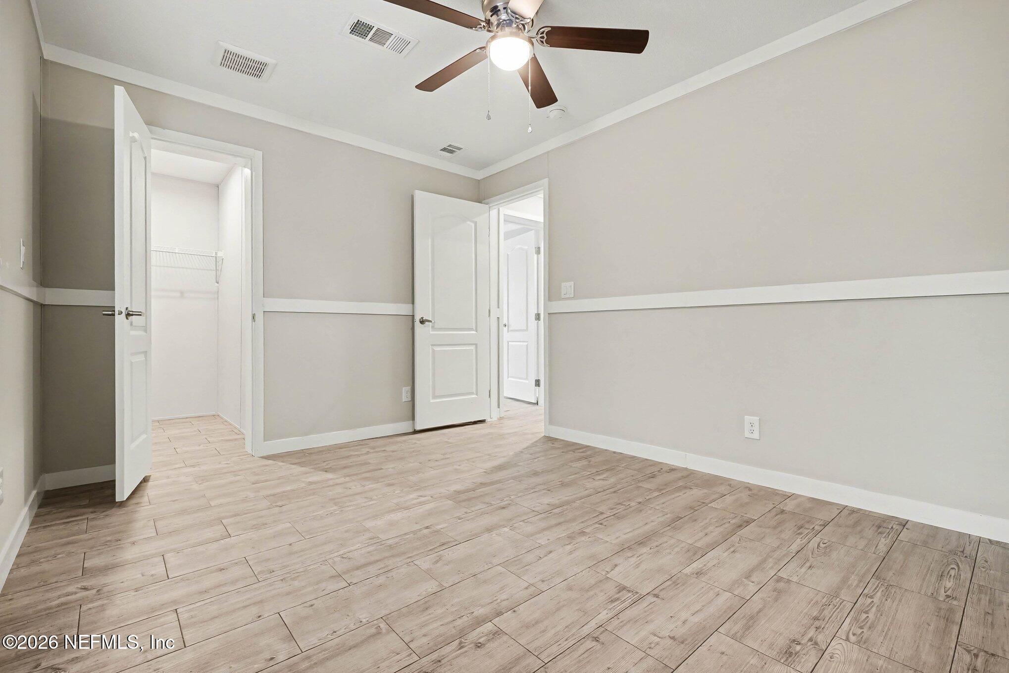 85083 Condor Lane Yulee, FL 32097 - Photo 17 of 32 a view of an empty room