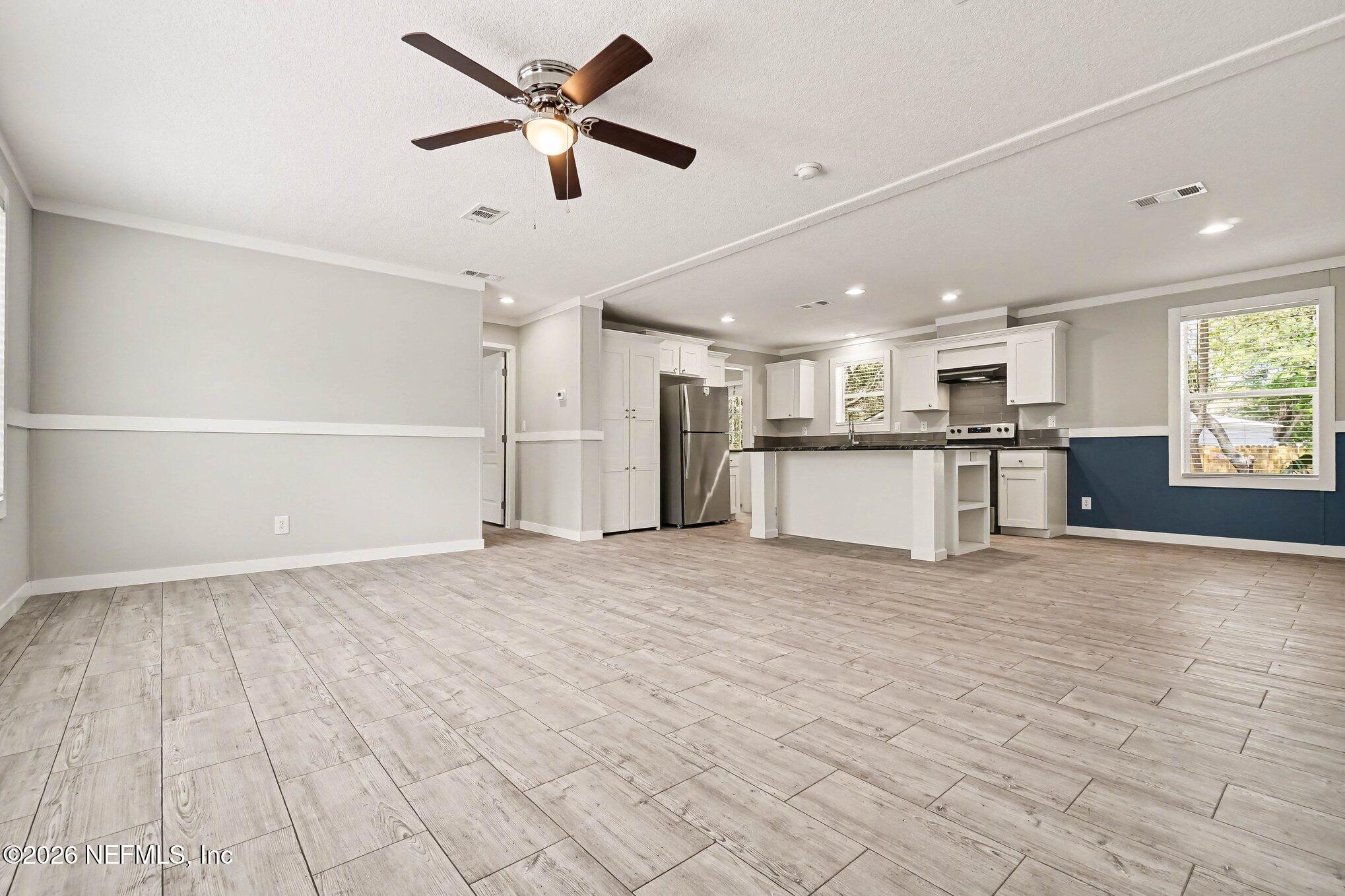 85083 Condor Lane Yulee, FL 32097 - Photo 2 of 32 a view of a kitchen with a sink and a window