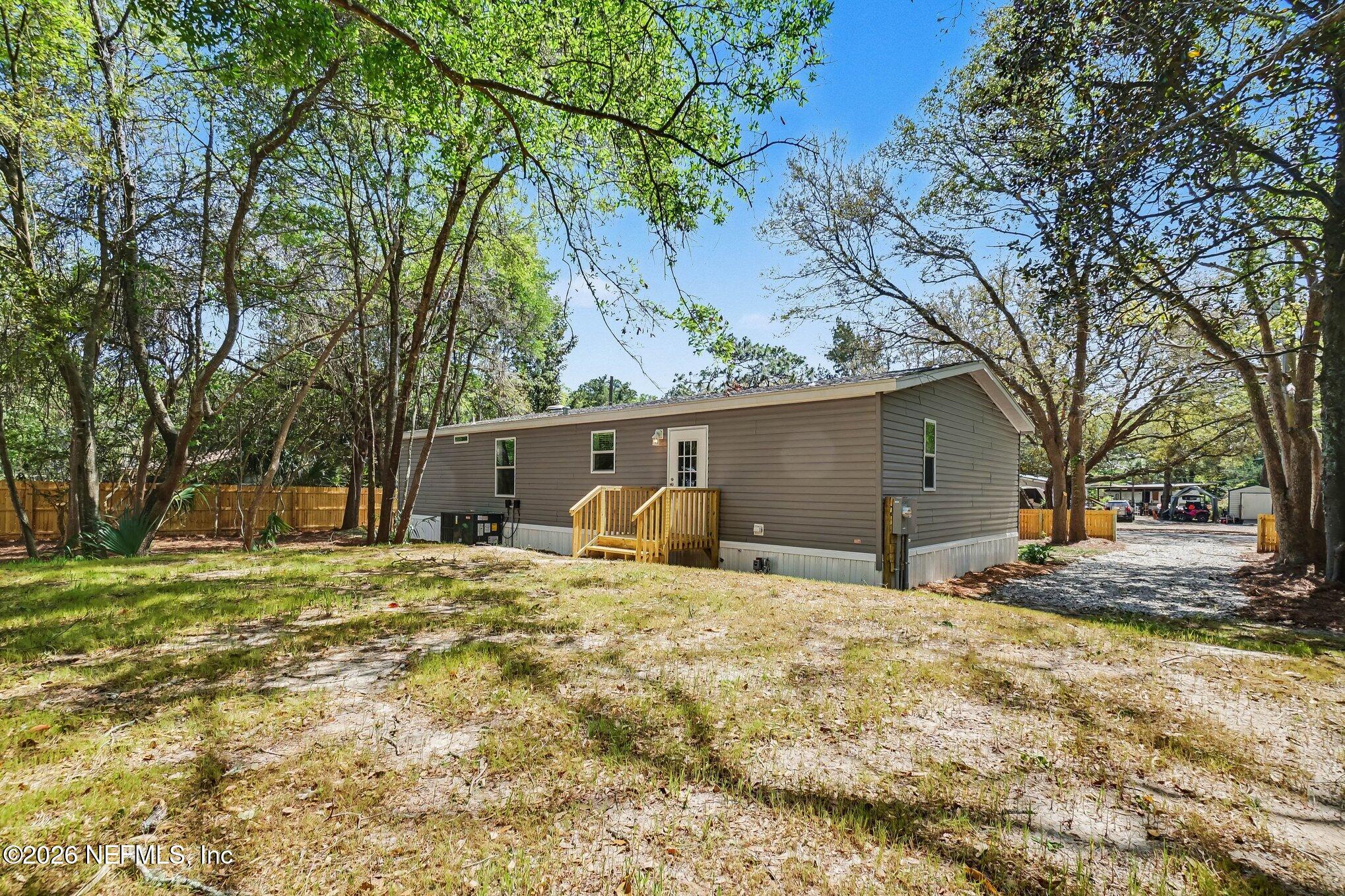 85083 Condor Lane Yulee, FL 32097 - Photo 25 of 32 a house view with a outdoor space
