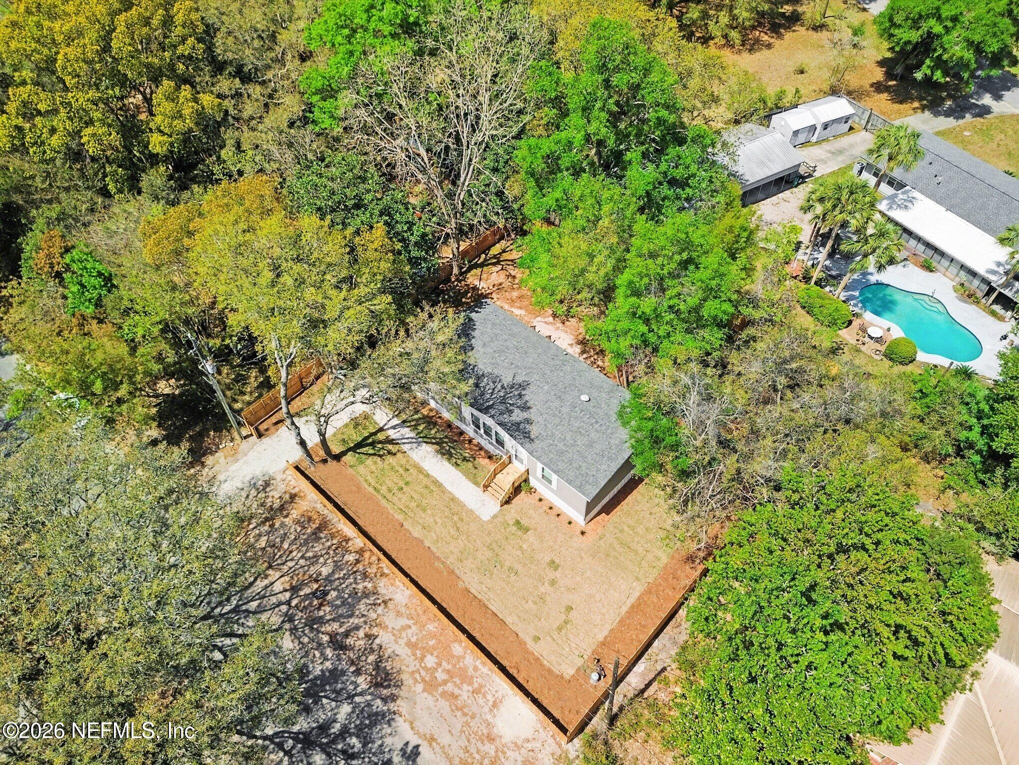 85083 Condor Lane Yulee, FL 32097 - Photo 31 of 32 an aerial view of a house with a yard