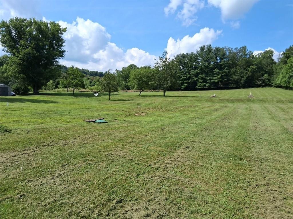 876 New Salem Road Uniontown, PA 15401 - Photo 1 of 3 a view of outdoor space with deck and yard