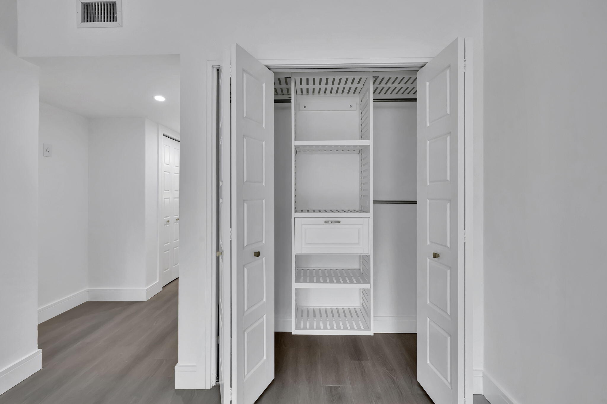 3100 North Palm Aire Drive, Unit 106 Pompano Beach, FL 33069 - Photo 19 of 42 wooden floor in a gallery