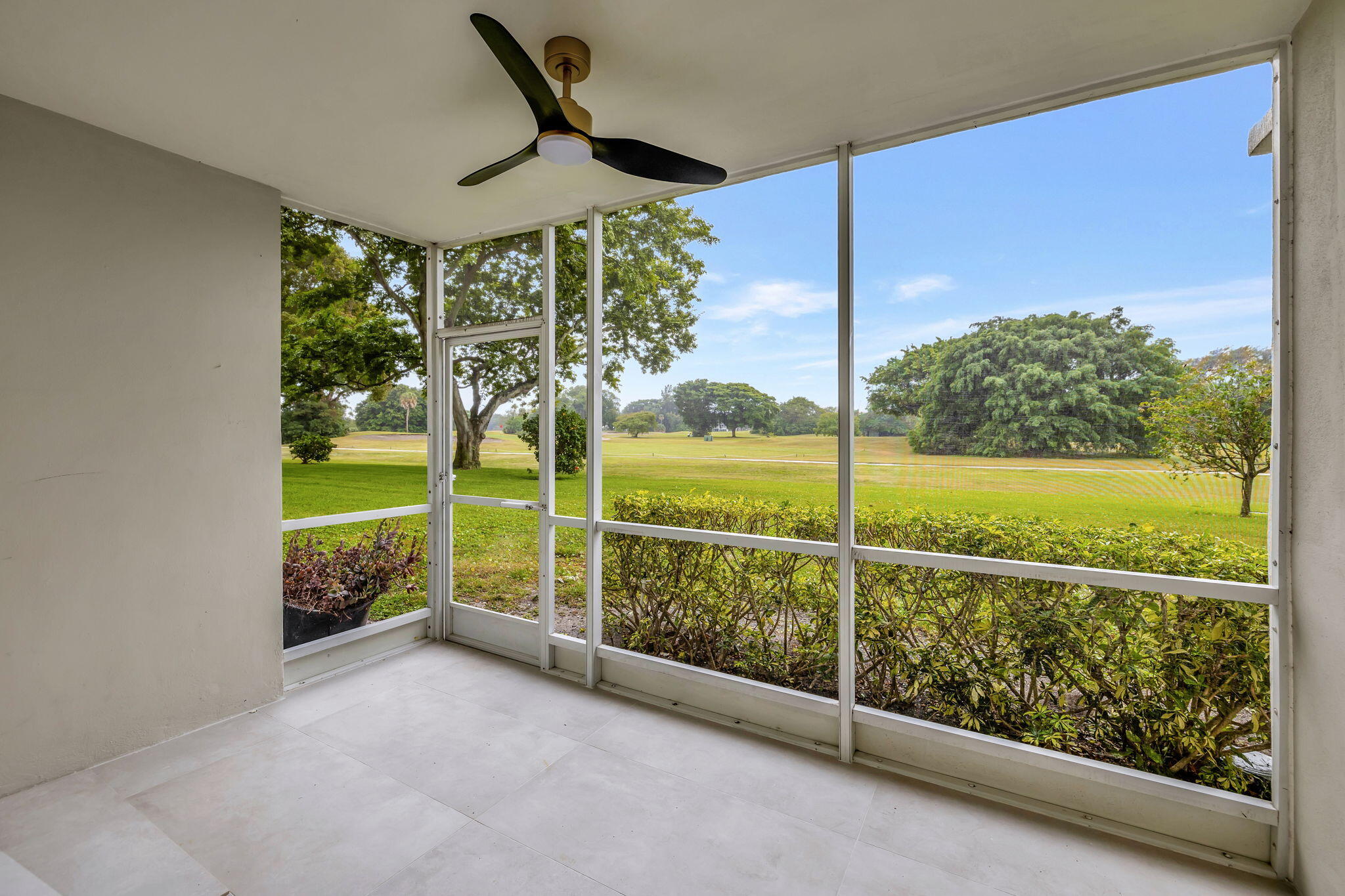 3100 North Palm Aire Drive, Unit 106 Pompano Beach, FL 33069 - Photo 26 of 42 a view of a porch