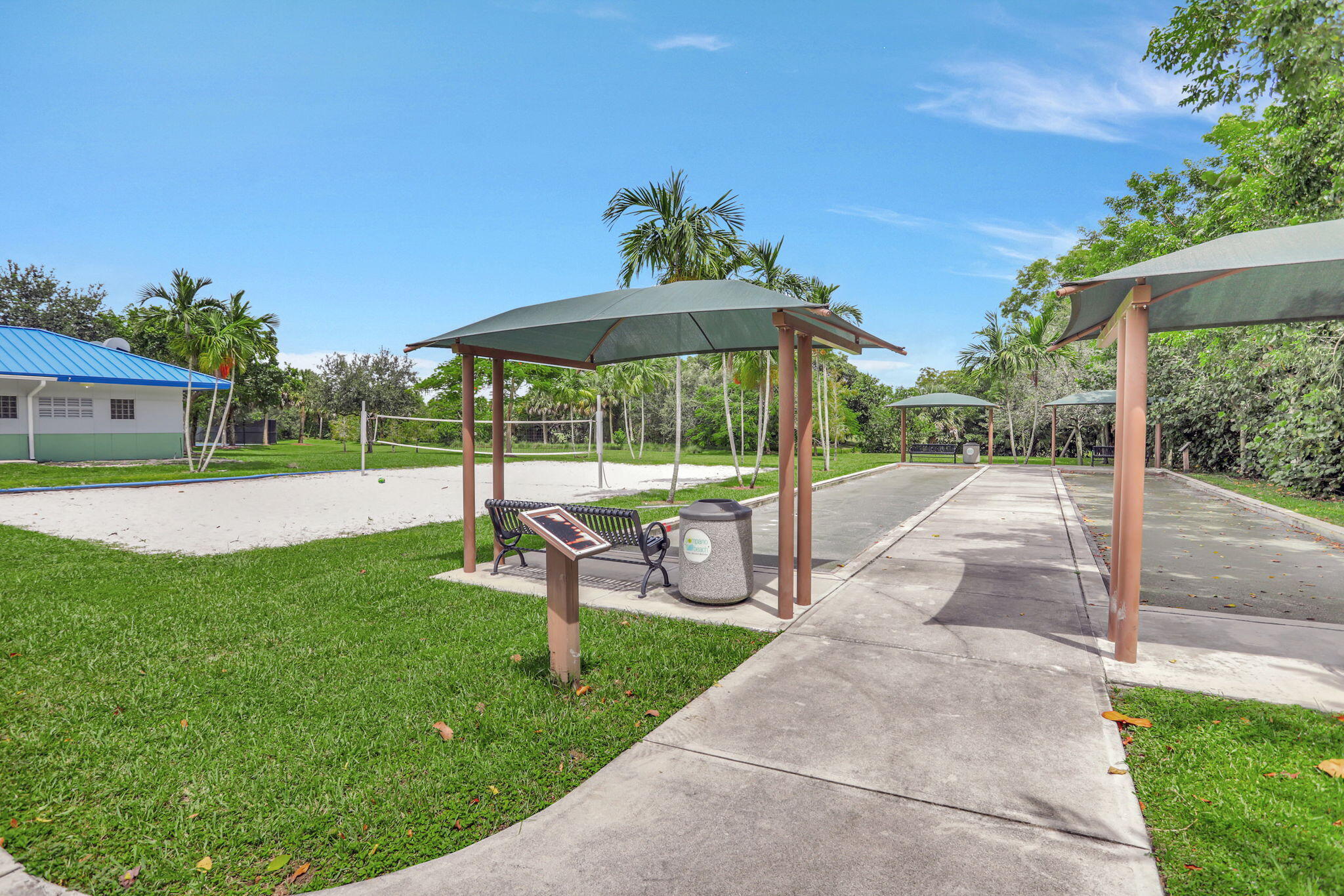 3100 North Palm Aire Drive, Unit 106 Pompano Beach, FL 33069 - Photo 35 of 42 a view of a park with a slide