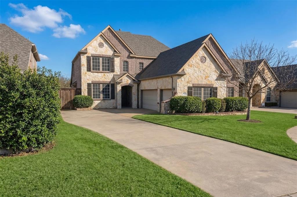 7625 Ridgedale Court Sachse, TX 75048 - Photo 1 of 40 a front view of a house with a yard