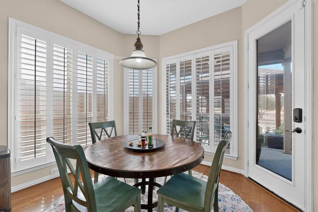 7625 Ridgedale Court Sachse, TX 75048 - Photo 15 of 40 a view of a dining room with furniture window and outside view