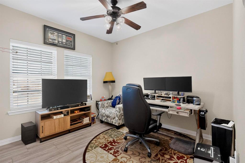 7625 Ridgedale Court Sachse, TX 75048 - Photo 22 of 40 a workspace with furniture and flat screen tv