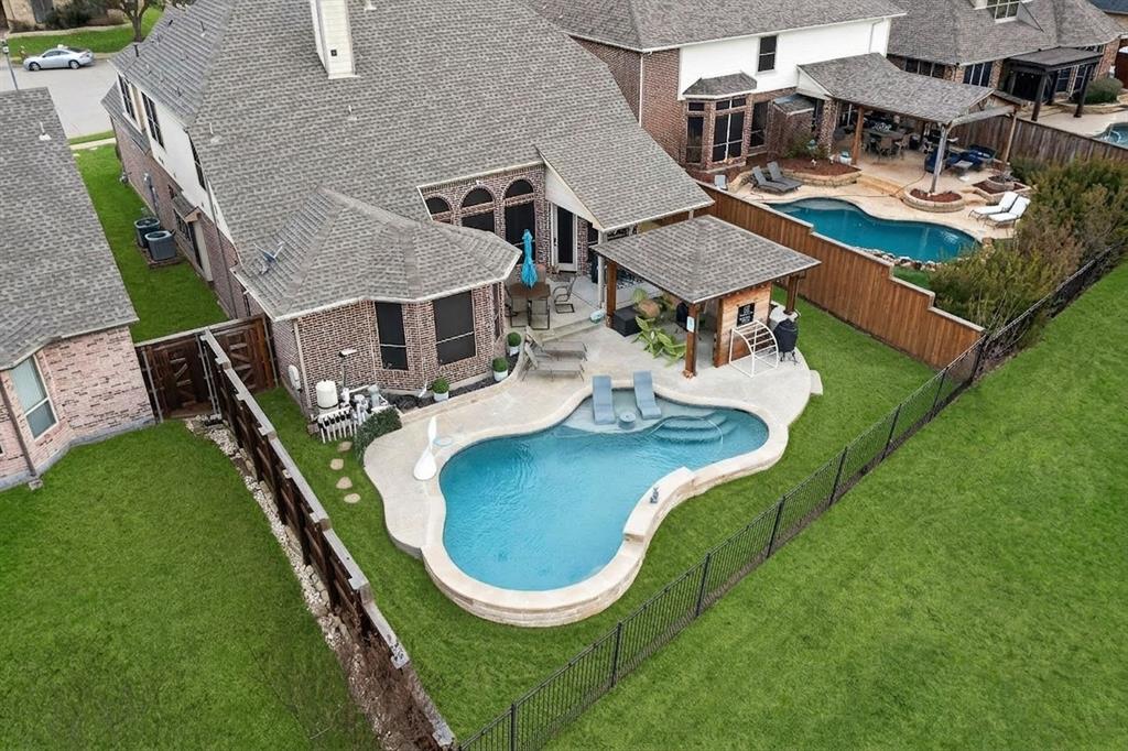 7625 Ridgedale Court Sachse, TX 75048 - Photo 40 of 40 an aerial view of a house with swimming pool and patio