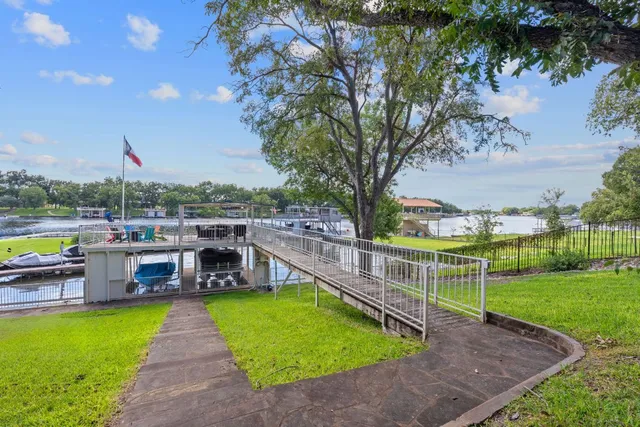 a view of a swimming pool with a patio