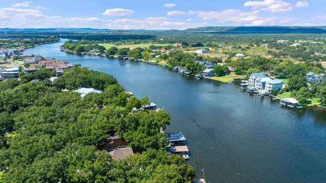 swimming pool view with a seating space