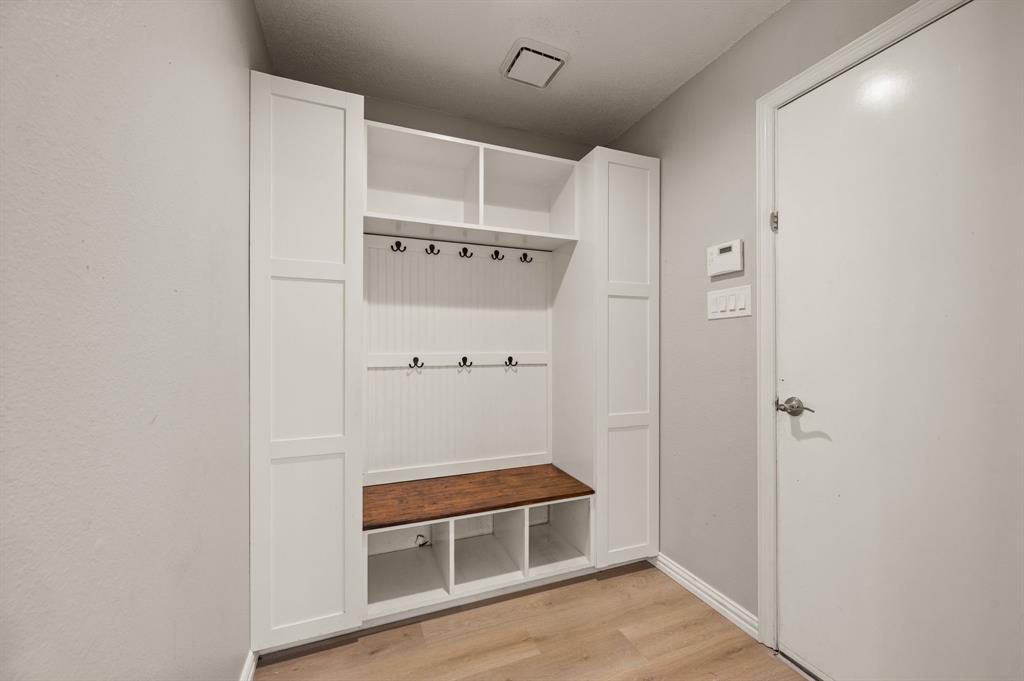 2704 Ridgemere Drive Flower Mound, TX 75028 - Photo 19 of 40 a view of a walk in closet