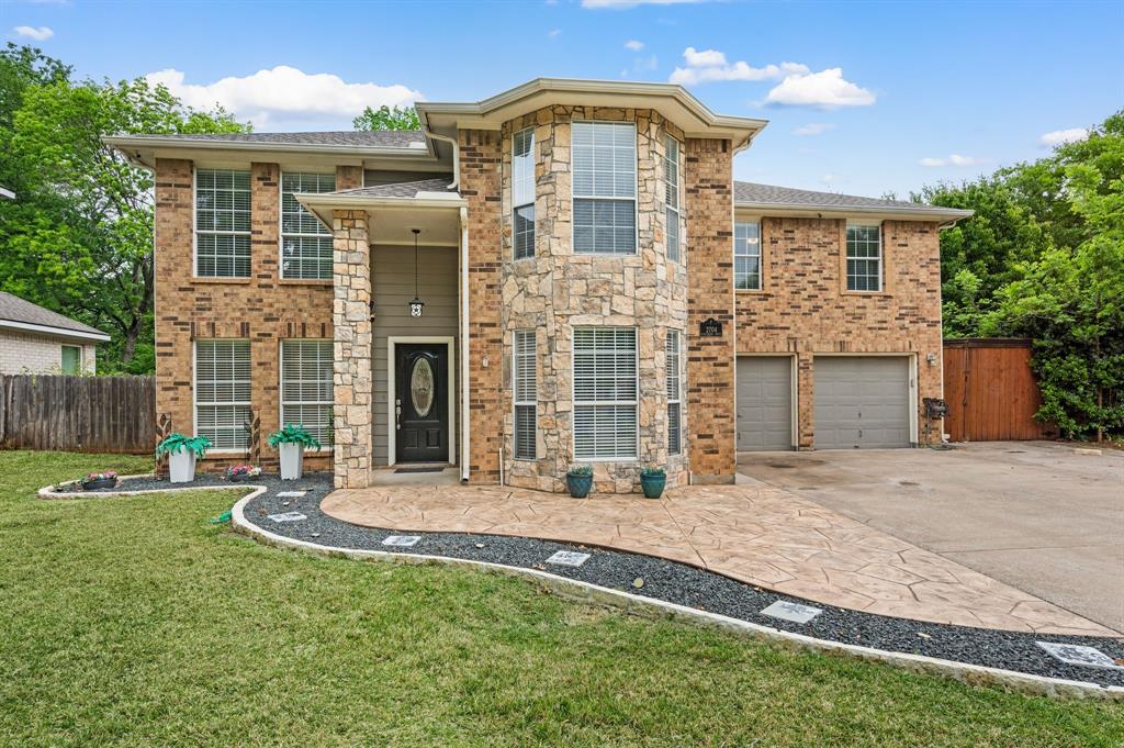 2704 Ridgemere Drive Flower Mound, TX 75028 - Photo 2 of 40 front view of a house with a yard