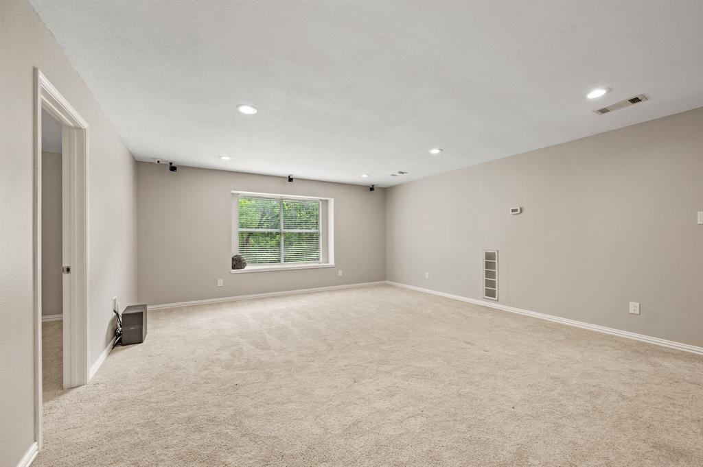 2704 Ridgemere Drive Flower Mound, TX 75028 - Photo 23 of 40 a view of an empty room with a window