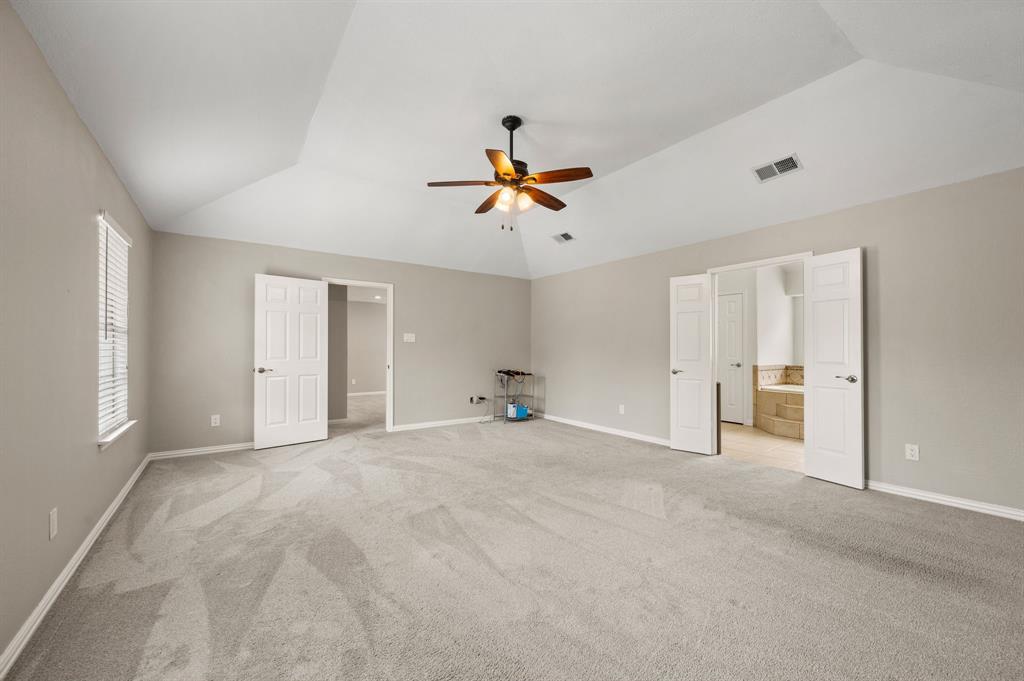 2704 Ridgemere Drive Flower Mound, TX 75028 - Photo 26 of 40 a view of empty room with ceiling fan