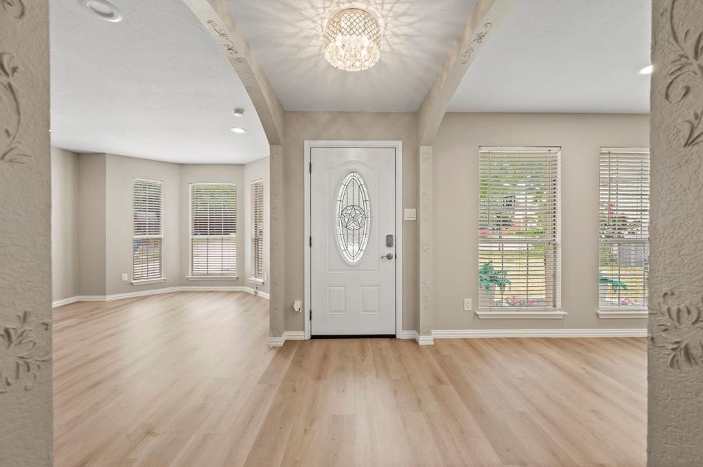 2704 Ridgemere Drive Flower Mound, TX 75028 - Photo 4 of 40 a view of an empty room with a window