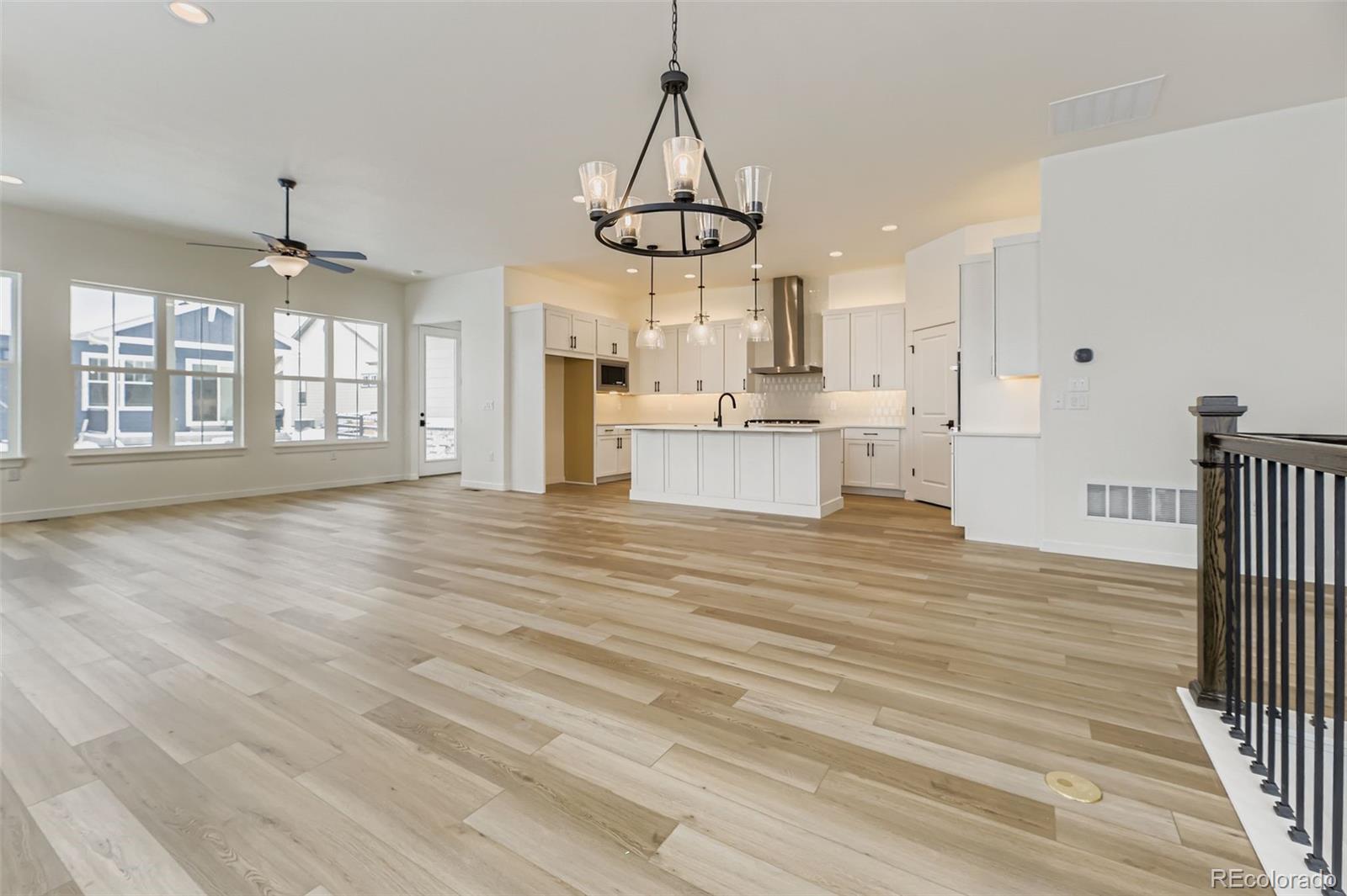 8902 South Riviera Way Aurora, CO 80016 - Photo 12 of 26 a view of a kitchen with cabinets