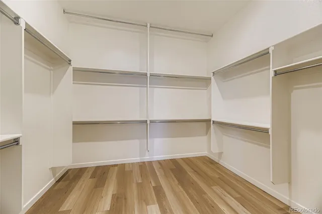 a view of an empty walk in closet
