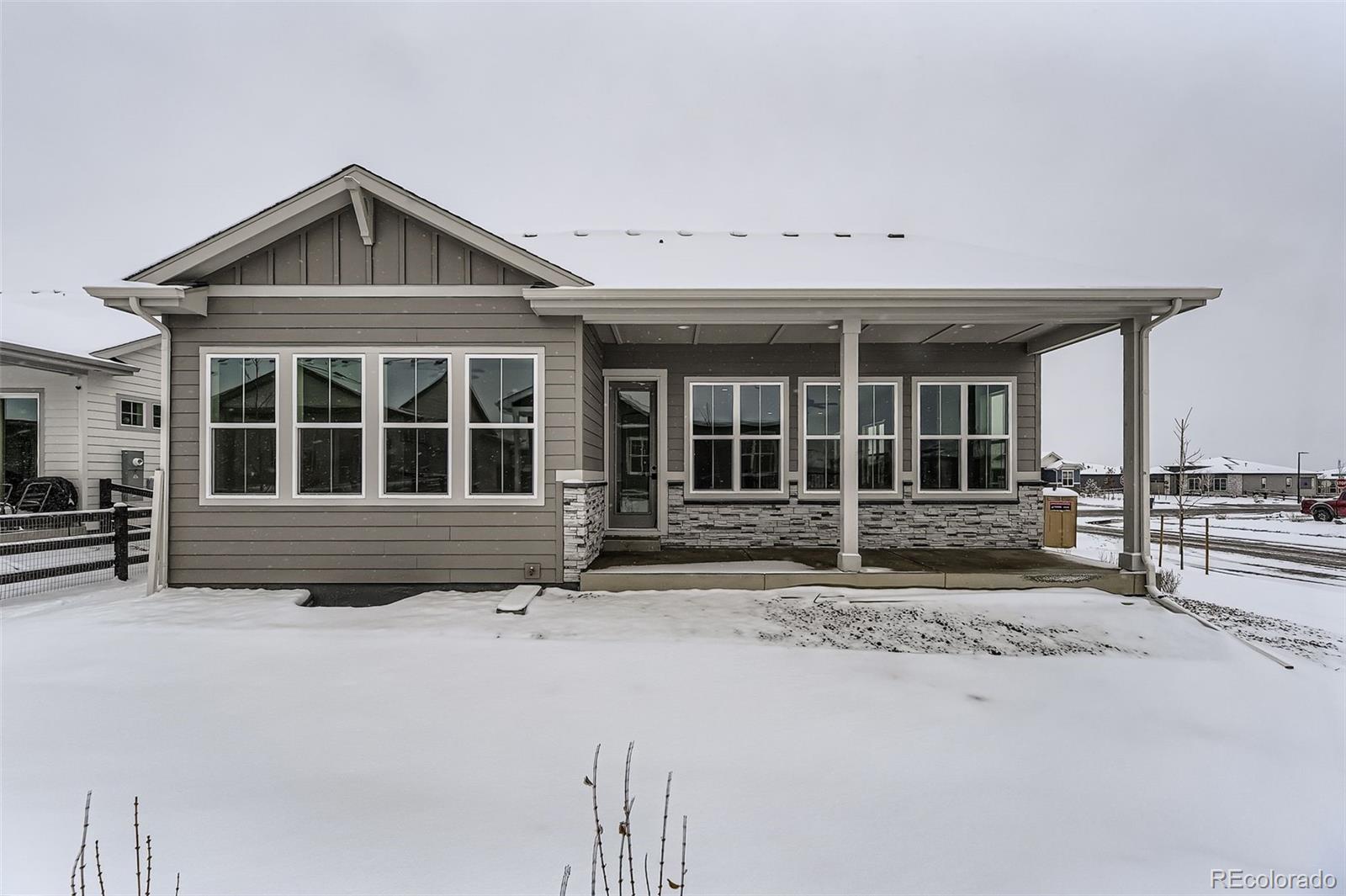 8902 South Riviera Way Aurora, CO 80016 - Photo 25 of 26 a view of a house with a yard