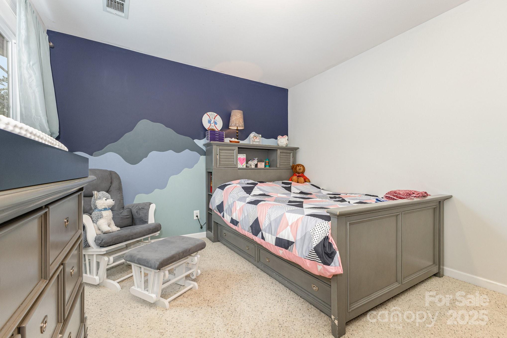 3384 Dunbar Lane Fort Mill, SC 29707 - Photo 25 of 34 a bedroom with a bed and chair