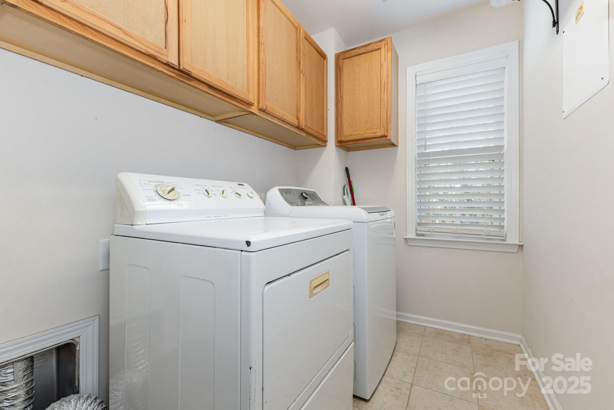 3384 Dunbar Lane Fort Mill, SC 29707 - Photo 29 of 34 a utility room with dryer and washer