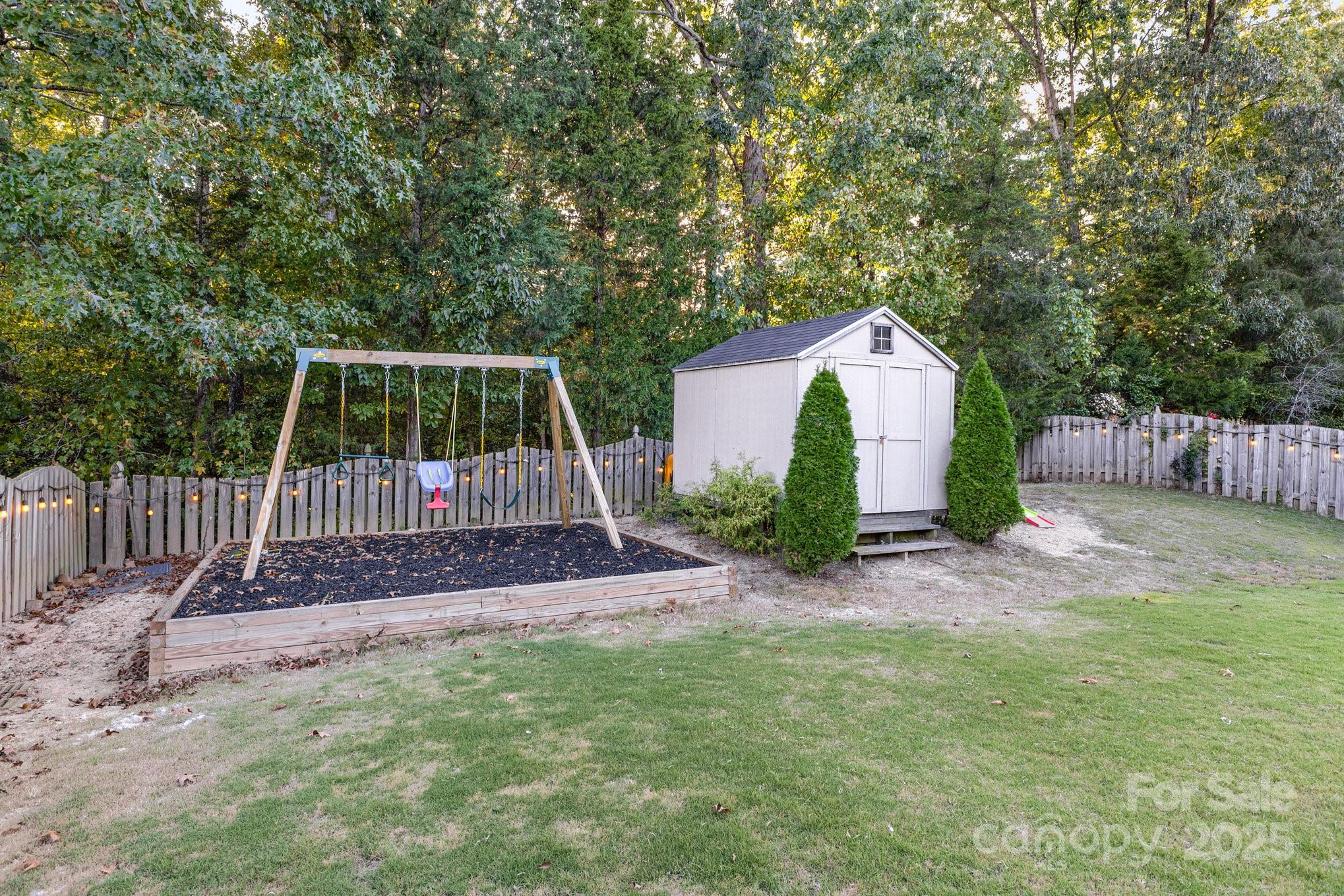 3384 Dunbar Lane Fort Mill, SC 29707 - Photo 30 of 34 a front view of a house with garden
