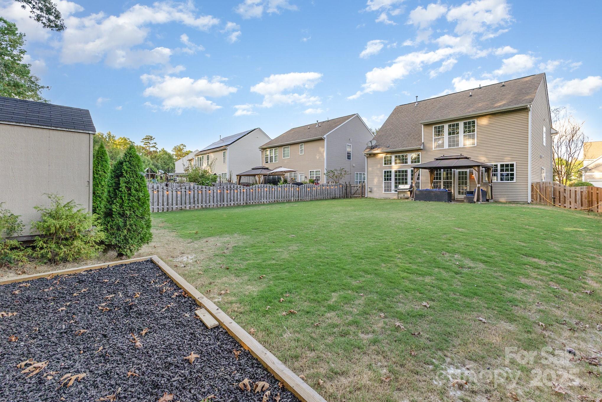 3384 Dunbar Lane Fort Mill, SC 29707 - Photo 31 of 34 a view of a yard in front of house