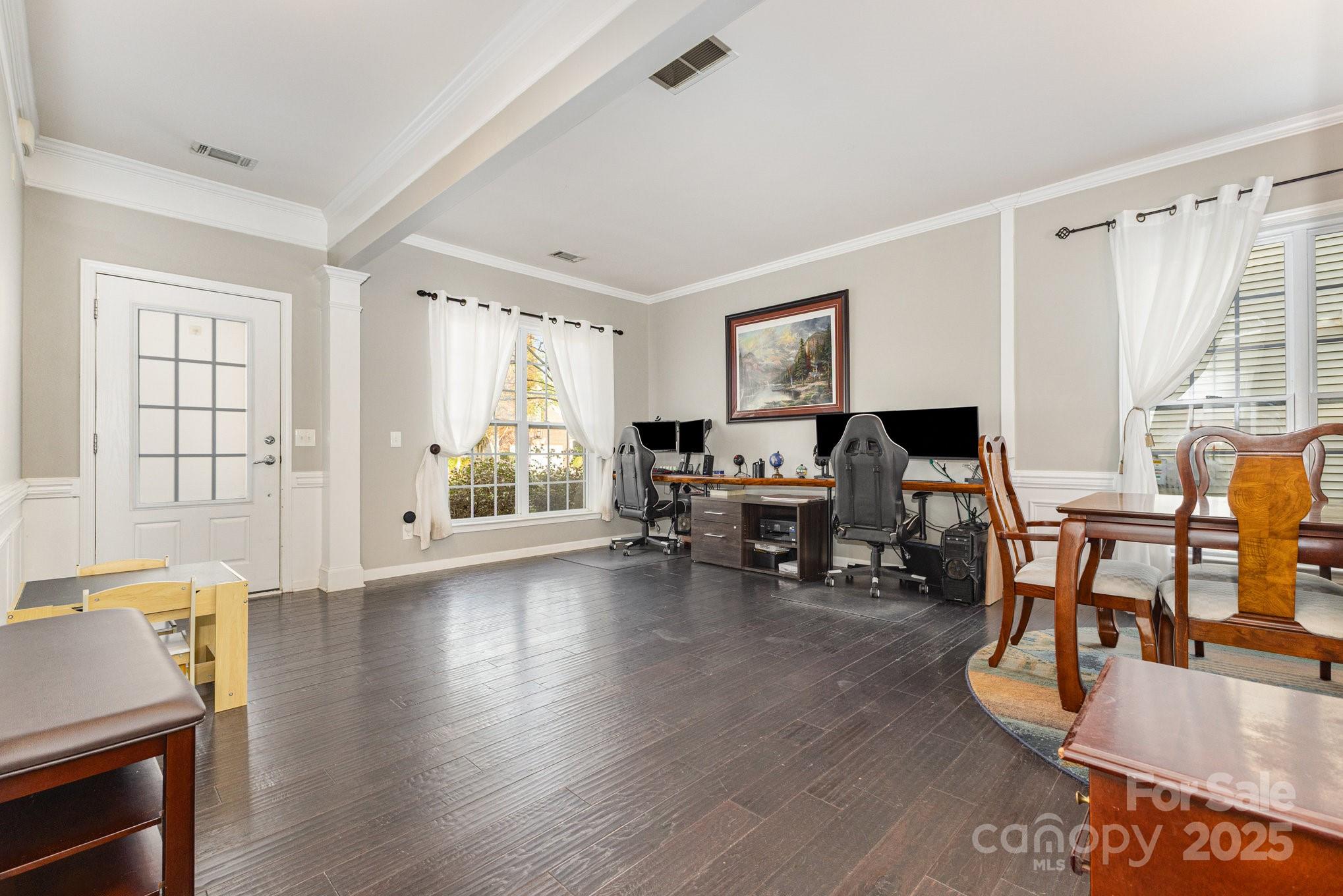 3384 Dunbar Lane Fort Mill, SC 29707 - Photo 4 of 34 a living room with furniture floor to ceiling window and wooden floor