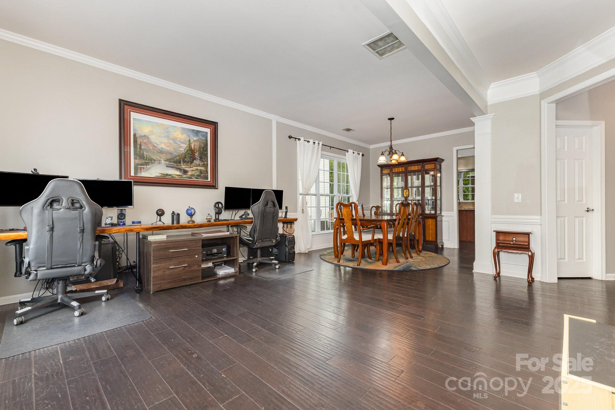 3384 Dunbar Lane Fort Mill, SC 29707 - Photo 5 of 34 a view of a livingroom with workspace and a window