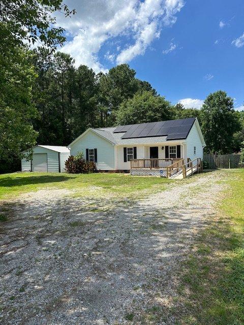 108 Conner Drive Clayton, NC 27520 - Photo 1 of 14 a house with swimming pool in front of it