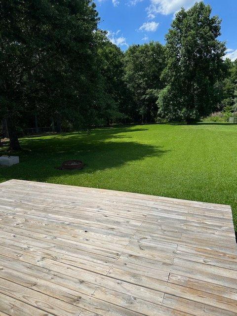 108 Conner Drive Clayton, NC 27520 - Photo 6 of 14 a view of a swimming pool and a yard