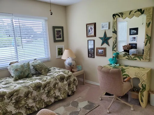 a view of a building with a palm tree