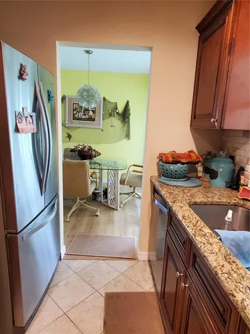 a bedroom with a bed and dresser