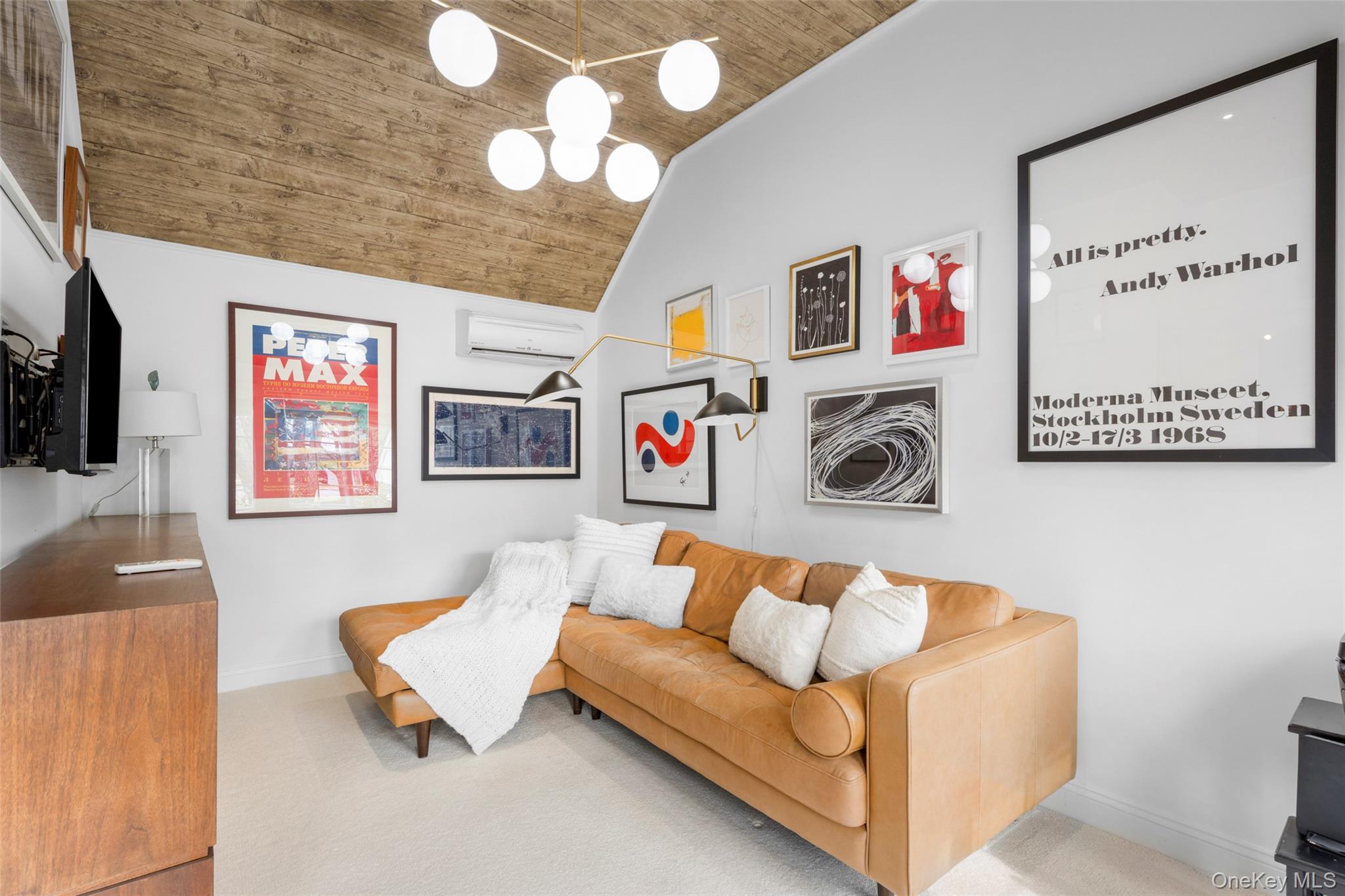 111 Berrian Road New Rochelle, NY 10804 - Photo 12 of 33 a living room with furniture and a flat screen tv